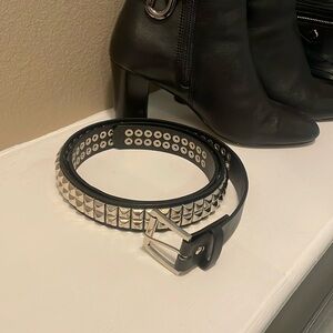 Black studded faux leather belt.